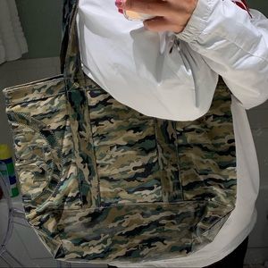 Tory Burch camouflaged tote.